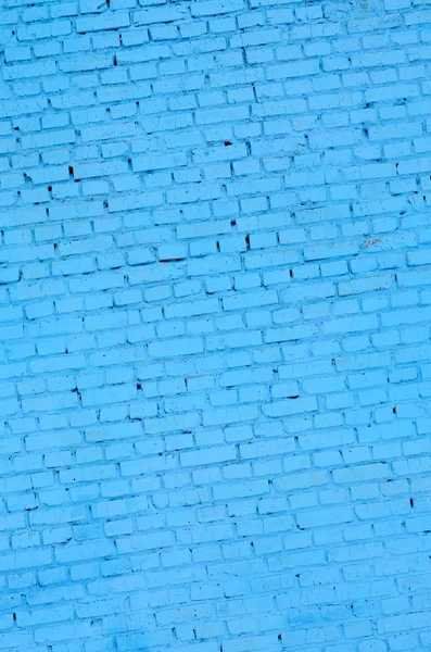 Square brick block wall background and texture. Painted in blue