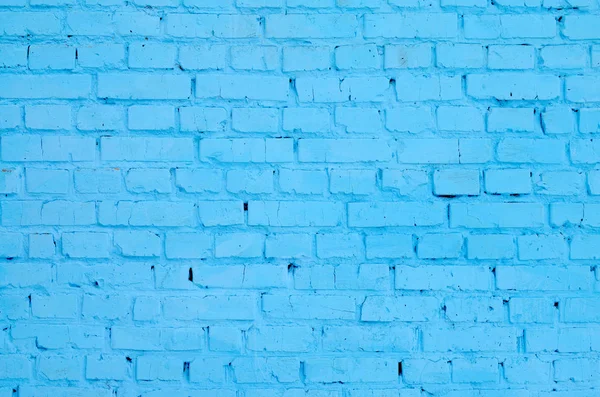 Square brick block wall background and texture. Painted in blue