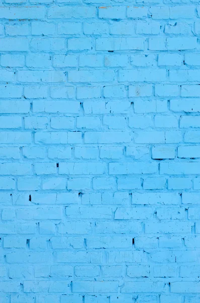 Square brick block wall background and texture. Painted in blue