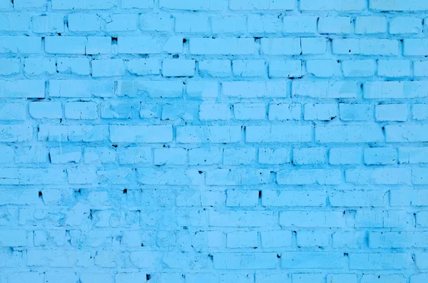 Square brick block wall background and texture. Painted in blue