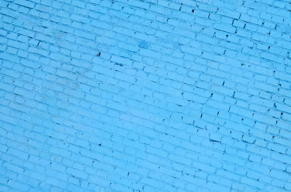 Square brick block wall background and texture. Painted in blue