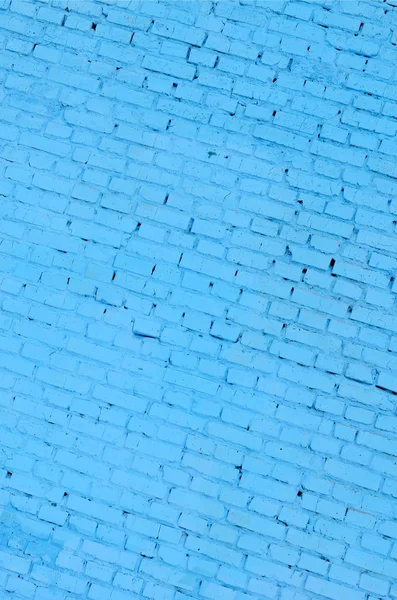 Square brick block wall background and texture. Painted in blue