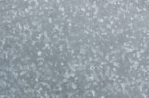 Zinc galvanized grunge metal texture may be used as background. Texture of galvanized iron roof plate background pattern