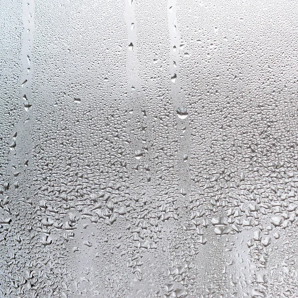 Struttura Una Goccia Pioggia Uno Sfondo Trasparente Bagnato Vetro Tonificata — Foto Stock