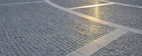 Fragment of the street square, folded out of a gray square pavin — Stock Photo, Image