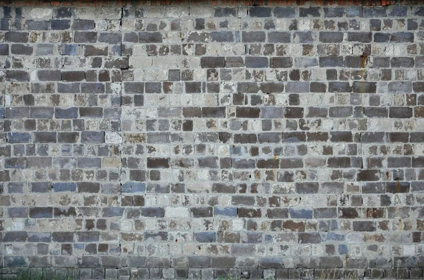 さまざまな異なる色合いの原石から倉庫の壁のテクスチャ — ストック写真