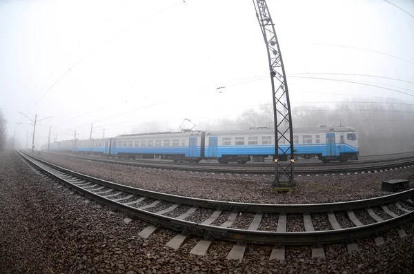 Ukrainian Suburban Train Rushes Railway Misty Morning Fisheye Photo Increased — Stock Photo, Image