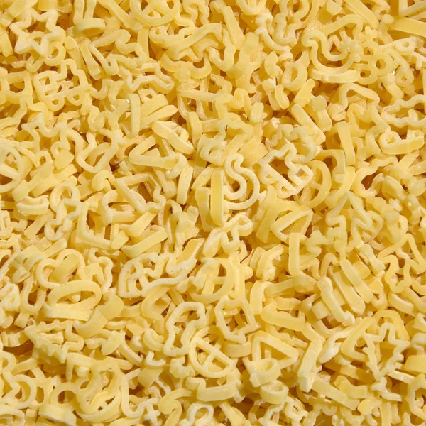 Texture Lot Curly Raw Yellow Pasta — Stock Photo, Image
