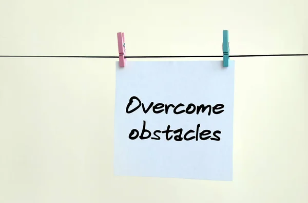 Overcome Obstacles Note Written White Sticker Hangs Clothespin Rope Background — Stock Photo, Image