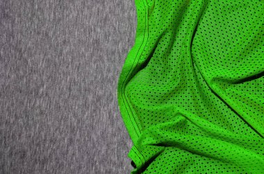 Üstten Görünüm kumaş Tekstil yüzey. Yakın çekim ısıtıcı yeminler ve kumaş doku ince çizgili desenli örgü. Spor giyim kumaş dokusu. Renkli basketbol forması ve ısıtıcı hoodie