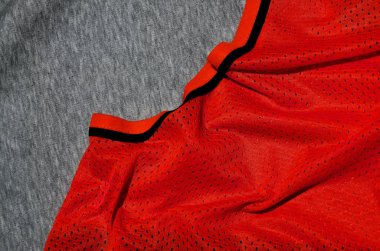 Üstten Görünüm kumaş Tekstil yüzey. Yakın çekim ısıtıcı yeminler ve kumaş doku ince çizgili desenli örgü. Spor giyim kumaş dokusu. Renkli basketbol forması ve ısıtıcı hoodie