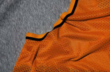 Üstten Görünüm kumaş Tekstil yüzey. Yakın çekim ısıtıcı yeminler ve kumaş doku ince çizgili desenli örgü. Spor giyim kumaş dokusu. Renkli basketbol forması ve ısıtıcı hoodie