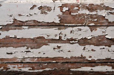 Zaman ve hava etkisi altında ganimet eski bir boya kaplamalı ahşap duvar dokusu