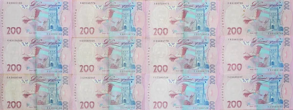 许多乌克兰货币纸币的特写 其面值为200格里夫纳汇率 乌克兰商业背景形象 — 图库照片