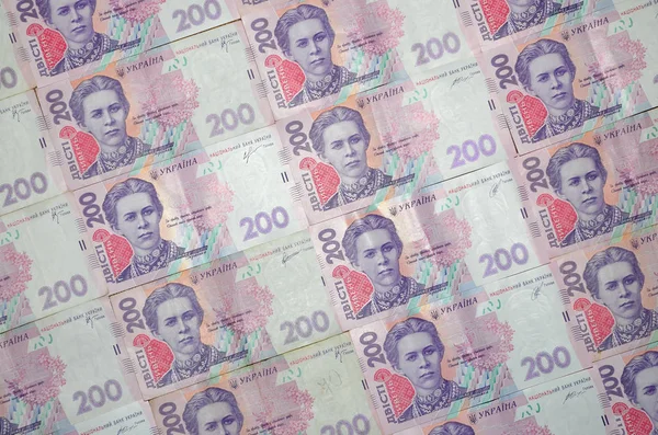 Close Pattern Many Ukrainian Currency Banknotes Par Value 200 Hryvnia — Stock Photo, Image