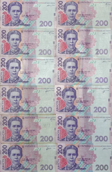 Close Pattern Many Ukrainian Currency Banknotes Par Value 200 Hryvnia — Stock Photo, Image