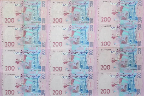 Close Pattern Many Ukrainian Currency Banknotes Par Value 200 Hryvnia — Stock Photo, Image