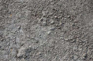 Gri renkli eski kabarık beton duvar dokusu. Arka plan resmini somut bir ürün