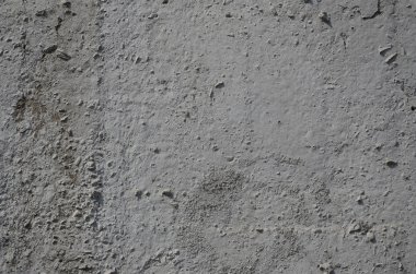 Gri renkli eski kabarık beton duvar dokusu. Arka plan resmini somut bir ürün