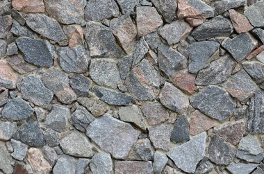 Birçok concreted taş çeşitli şekiller güçlü bir taş duvar dokusu