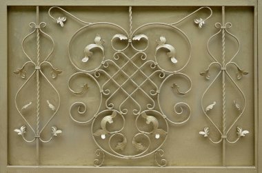 Altın metal geçit doku ile güzel bir çiçek desenli dövme metal