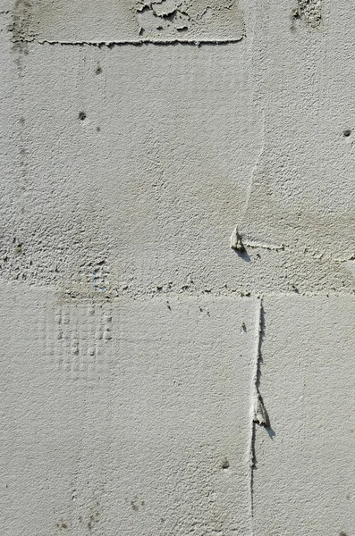 補強の混合物にまみれていますグレー発泡ポリスチレン板で覆われた壁のテクスチャ 壁の絶縁材のステージ — ストック写真