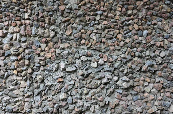 Textura Uma Parede Pedra Forte Muitas Pedras Concretas Várias Formas — Fotografia de Stock