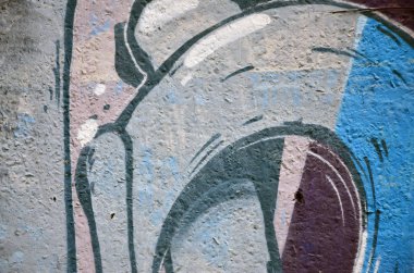 Arka plan resmi duvarın renkli soyut grafiti ile dekore edilmiştir. Sokak sanatı kavramı