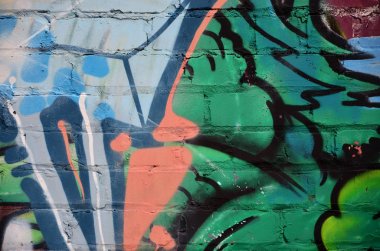 Arka plan resmi duvarın renkli soyut grafiti ile dekore edilmiştir. Sokak sanatı kavramı