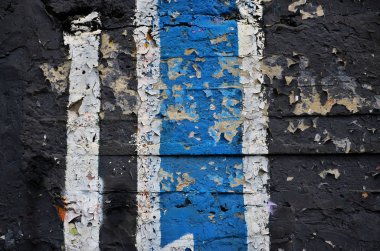 Sokak sanatı. Duvarda renkli bir duvar yazısı var. Arka plan için parça. Bir duvar yazısının soyut ayrıntıları