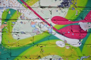 Arka plan resmi duvarın renkli soyut grafiti ile dekore edilmiştir. Sokak sanatı kavramı