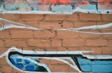 Arka plan resmi duvarın renkli soyut grafiti ile dekore edilmiştir. Sokak sanatı kavramı