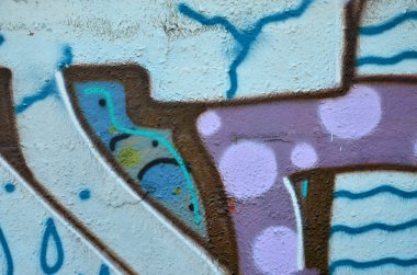Arka plan resmi duvarın renkli soyut grafiti ile dekore edilmiştir. Sokak sanatı kavramı