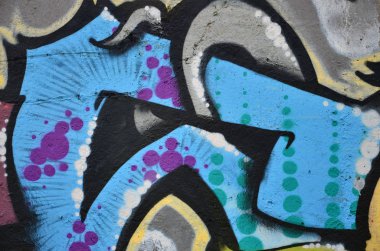 Arka plan resmi duvarın renkli soyut grafiti ile dekore edilmiştir. Sokak sanatı kavramı