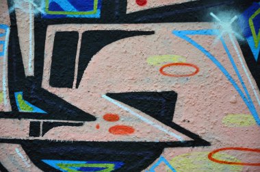 Arka plan resmi duvarın renkli soyut grafiti ile dekore edilmiştir. Sokak sanatı kavramı