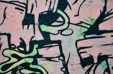 Arka plan resmi duvarın renkli soyut grafiti ile dekore edilmiştir. Sokak sanatı kavramı
