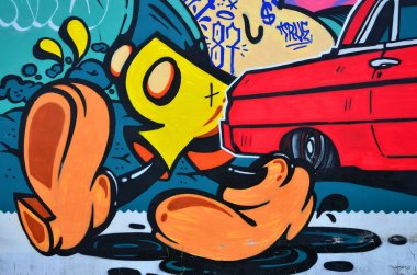 Grafiti çizim ayrıntılı bir görüntü. Çizgi film karakterleri ile bir kavramsal sokak sanatı arka plan