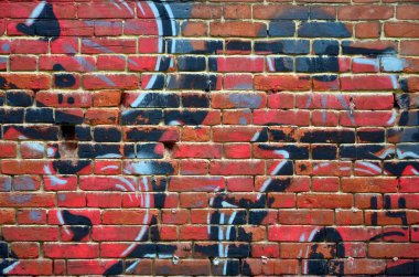 Sanat toprak altında. Güzel sokak sanat graffiti tarzı. Duvar Soyut çizimler ev boya ile dekore edilmiştir. Modern ikonik kentsel kültür sokak gençlik. Soyut şık resim duvarda