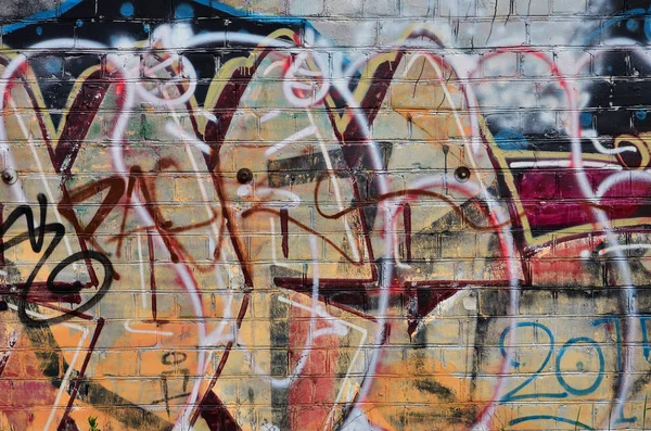 Arka plan resmi duvarın renkli soyut grafiti ile dekore edilmiştir. Sokak sanatı kavramı