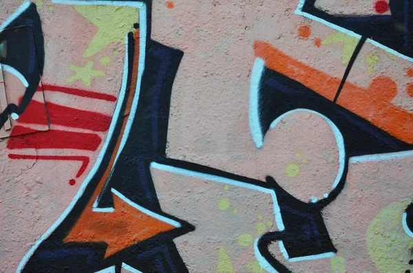 Street art. Colorful graffiti on the wall. Fragment for background. Abstract detail of a graffiti