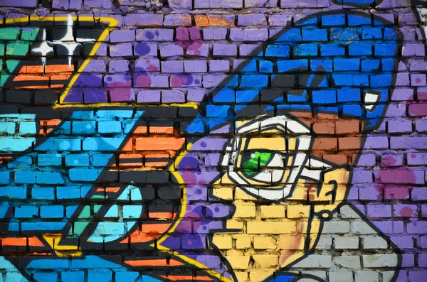 Detailed image of color graffiti drawing. Background Street art background with a painted character. Part of the colorful masterpiece by the professional graffiti artists