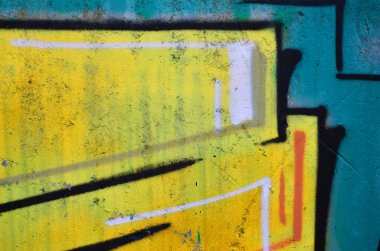 Grafiti çizim Ayrıntılar görünümünü kapatın. Sokak sanatı ve vandalizm temanın arka plan görüntüsü. Sprey boya ile boyanmış duvar dokusu