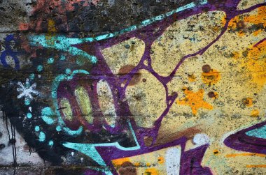 Grafiti çizim Ayrıntılar görünümünü kapatın. Sokak sanatı ve vandalizm temanın arka plan görüntüsü. Sprey boya ile boyanmış duvar dokusu