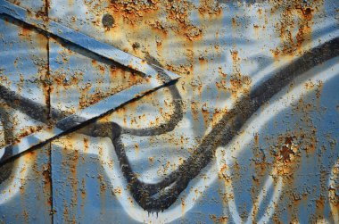 Grafiti çizim Ayrıntılar görünümünü kapatın. Sokak sanatı ve vandalizm temanın arka plan görüntüsü. Sprey boya ile boyanmış duvar dokusu