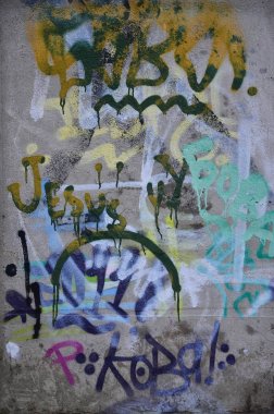 Grafiti çizim Ayrıntılar görünümünü kapatın. Sokak sanatı ve vandalizm temanın arka plan görüntüsü. Sprey boya ile boyanmış duvar dokusu