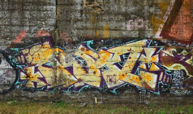 Grafiti çizim Ayrıntılar görünümünü kapatın. Sokak sanatı ve vandalizm temanın arka plan görüntüsü. Sprey boya ile boyanmış duvar dokusu