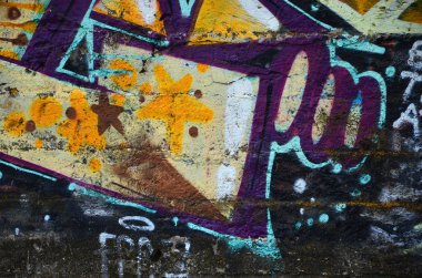 Grafiti çizim Ayrıntılar görünümünü kapatın. Sokak sanatı ve vandalizm temanın arka plan görüntüsü. Sprey boya ile boyanmış duvar dokusu