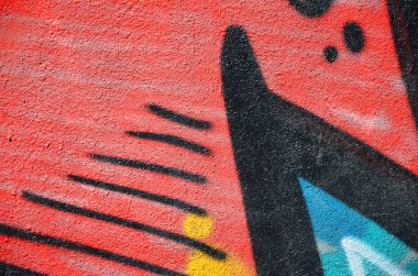 Eski bir renkli grafiti duvardaki çizim parçası. Arka plan resmi olarak bir örnek sokak sanatı, vandalizm ve sprey boya ile duvar resmi