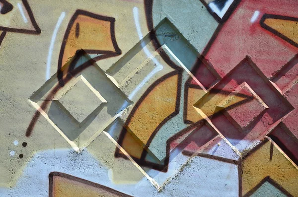 Texture of a fragment of the wall with graffiti painting, which is depicted on it. An image of a piece of graffiti drawing as a photo on street art and graffiti culture topics