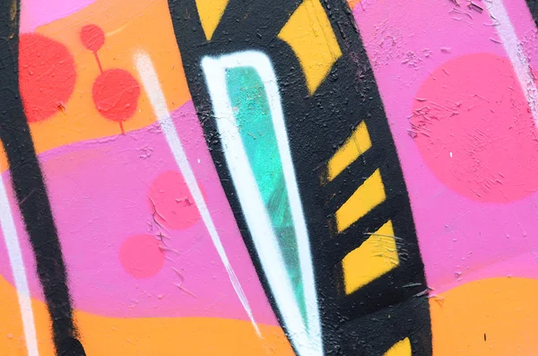 Fragment of a beautiful graffiti pattern in pink and green with a black outline. Street art background image